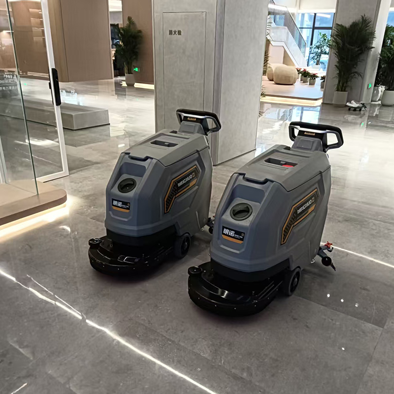 百威电气两台V53手推式自走洗地机